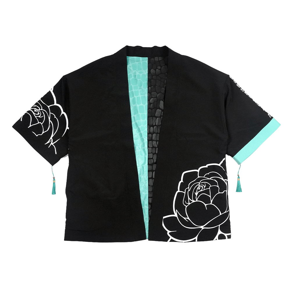 Black and turquoise kimono with white interior and exterior designs and a snake scale finish