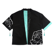 Black and turquoise kimono with white interior and exterior designs and a snake scale finish